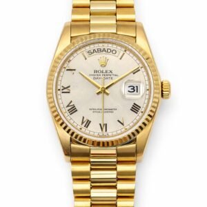 Rolex Day-Date Ref. 18038 36mm 18k yellow gold case Fluted bezel President bracelet Day-Date complication Automatic movement (Cal. 3055) Excellent condition Classic quickset Day-Date “President” reference from the late 1970s–1980s era.